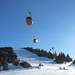 Cable car ski lift over mountain landscape