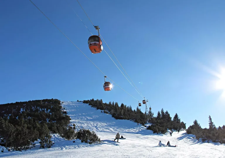 Cable car ski lift over mountain landscape